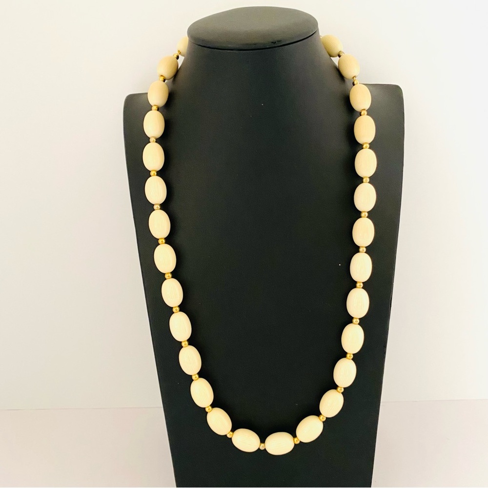Napier Signed Lucite Faux Ivory Beads and Gold Tone Long Necklace.